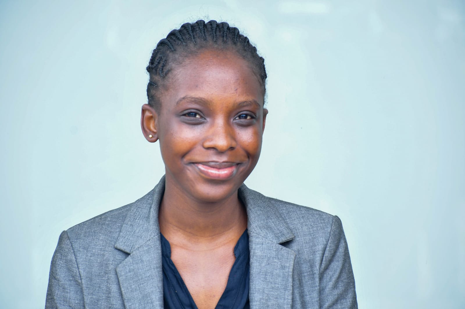 Angie Elma Okuta, Research Intern at MMK Consult, based in Nairobi, Kenya.